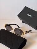 CHANEL Sunglasses: Oval